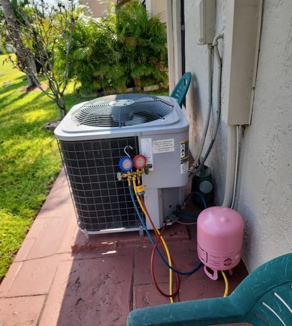 professional refilling air conditioner gas